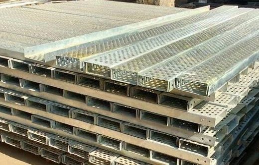 A galvanized steel perforated cable tray showing the ventilated base designed for managing and protecting electrical cables.